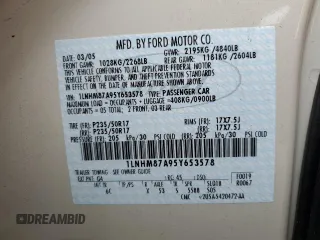 2005 Lincoln LS Sport z VIN 1LNHM87A95Y653578, wystawiony jako Copart lot #76339924 z przebiegiem 97 998 mil mil oraz Szkoda całkowita • Salvage title. Historia ofert i sprzedaży dostępna na DreamBid. Obrazek 12.