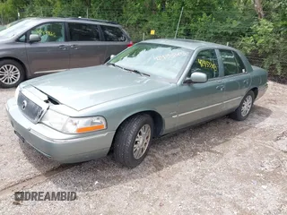 2005 Mercury Grand Marquis LS Premium z VIN 2MHHM75W95X607697, wystawiony jako IAAI lot #42453303 z przebiegiem 142 879 mil mil oraz . Historia ofert i sprzedaży dostępna na DreamBid. Obrazek 2.