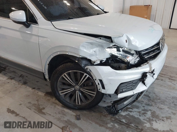 2019 Volkswagen Tiguan SE with VIN 3VV3B7AX9KM030028, listed as a IAAI auction lot 40445099 with 85,400 mi miles and . Bid and sale history available at DreamBid. Image 17.