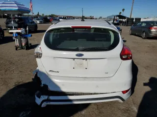 2015 Ford Focus SE with VIN 1FADP3K29FL334599, listed as a Copart auction lot 46926475 with 127,537 mi miles and Salvage Title. Bid and sale history available at DreamBid. Image 6.