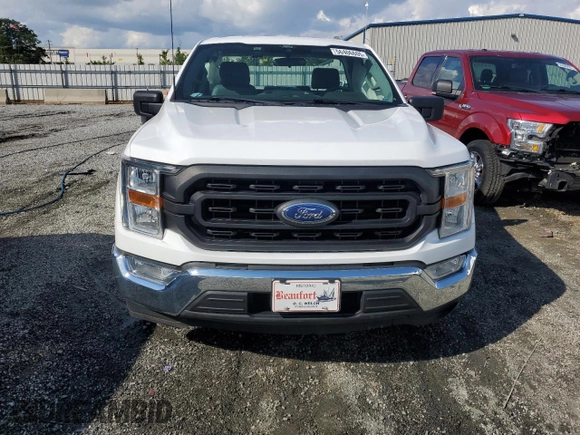 2021 Ford F-150 XL with VIN 1FTMF1CP5MKE21303, listed as a Copart auction lot 56406605 with 93,906 mi miles and Salvage title. Bid and sale history available at DreamBid. Image 5.