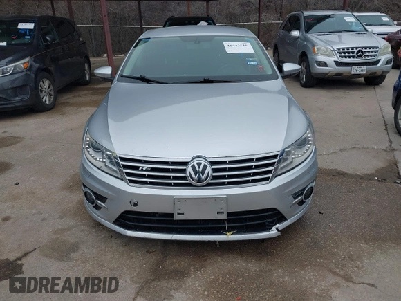 2014 Volkswagen CC Sport with VIN WVWBN7ANXEE501758, listed as a IAAI auction lot 41443518 with 193,259 mi miles and . Bid and sale history available at DreamBid. Image 6.
