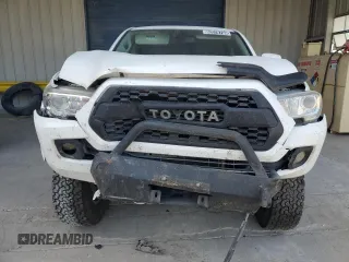2021 Toyota Tacoma SR5 z VIN 3TMBZ5DN6MM031399, wystawiony jako Copart lot #82078704 z przebiegiem 139 358 mil mil oraz Czysty tytuł • Clean title. Historia ofert i sprzedaży dostępna na DreamBid. Obrazek 5.