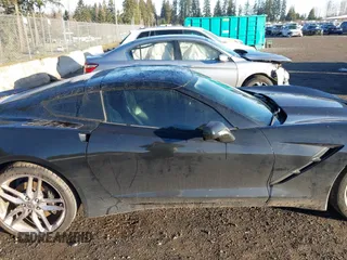 2014 Chevrolet Corvette Z51 3LT z VIN 1G1YM2D79E5121445, wystawiony jako IAAI lot #41652476 z przebiegiem 56 988 mil mil oraz . Historia ofert i sprzedaży dostępna na DreamBid. Obrazek 13.