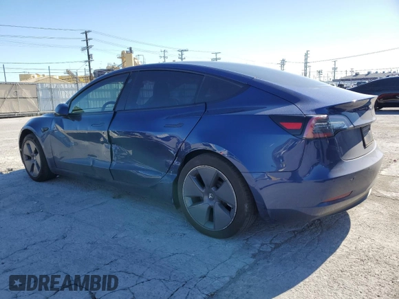 2021 Tesla Model 3 Long Range with VIN 5YJ3E1EBXMF925147, listed as a Copart auction lot 49741275 with 106,947 mi miles and Salvage Title. Bid and sale history available at DreamBid. Image 2.
