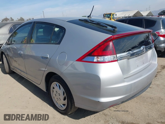 2012 Honda Insight LX с VIN JHMZE2H56CS001570, выставлен на аукционе IAAI как лот 41461236 с пробегом 129 431 миль миль и . История ставок и продаж доступна на DreamBid. Изображение 3.