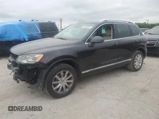 2012 Volkswagen Touareg Lux with VIN WVGEF9BP7CD008639, listed as a Copart auction lot 58060325 with 151,817 mi miles and Salvage title. Bid and sale history available at DreamBid. Image 1.