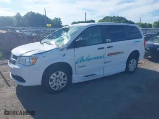 2019 Dodge Grand Caravan SE with VIN 2C7WDGBG7KR808178, listed as a IAAI auction lot 39601907 with 128,458 mi miles. Bid and sale history available at carsss.com. Image 2.