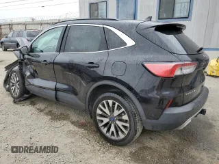 2020 Ford Escape Titanium with VIN 1FMCU9J97LUA59056, listed as a Copart auction lot 58445885 with Not provided miles and Salvage title. Bid and sale history available at DreamBid. Image 2.