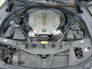 2011 BMW 7 Series with VIN WBAKX8C57BC198326, listed as a Copart auction lot 69985174 with 142,353 mi miles and Clean title. Bid and sale history available at DreamBid. Image 11.