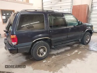 1999 Mercury Mountaineer z VIN 4M2DU55P0XUJ08169, wystawiony jako IAAI lot #42150344 z przebiegiem 164 994 mil mil oraz . Historia ofert i sprzedaży dostępna na DreamBid. Obrazek 4.