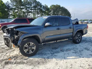 2019 Toyota Tacoma SR5 with VIN 3TMAZ5CN4KM094415, listed as a Copart auction lot 53668685 with 75,171 mi miles and Salvage title. Bid and sale history available at DreamBid. Image 1.