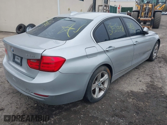 2015 BMW 3 Series 328i xDrive with VIN WBA3B5G57FNS12490, listed as a IAAI auction lot 41927689 with 999,999 mi miles. Bid and sale history available at carsss.com. Image 4.