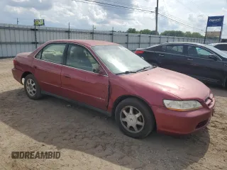 2000 Honda Accord SE with VIN JHMCG5673YC023811, listed as a Copart auction lot 56331885 with 194,416 mi miles and Salvage title. Bid and sale history available at DreamBid. Image 4.