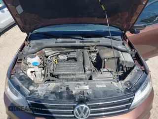2016 Volkswagen Jetta Sedan 1.4T SE with VIN 3VWD67AJ2GM340416, listed as a IAAI auction lot 41663211 with 157,283 mi miles. Bid and sale history available at carsss.com. Image 10.