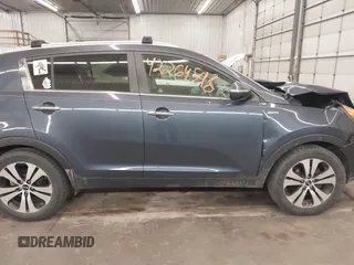 2011 Kia Sportage EX with VIN KNDPCCA27B7037886, listed as a IAAI auction lot 42264598 with 211,538 mi miles and . Bid and sale history available at DreamBid. Image 14.