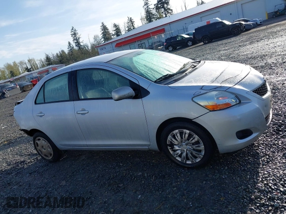 2009 Toyota Yaris with VIN JTDBT903194041550, listed as a IAAI auction lot 41993832 with 214,544 mi miles. Bid and sale history available at carsss.com. Image 14.