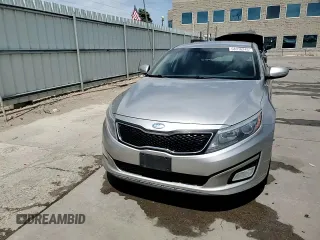 2014 Kia Optima LX z VIN KNAGM4A79E5470153, wystawiony jako Copart lot #58316245 z przebiegiem 85 904 mil mil oraz Czysty tytuł • Clean title. Historia ofert i sprzedaży dostępna na DreamBid. Obrazek 13.