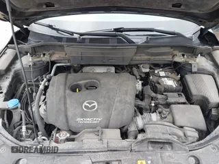 2018 Mazda CX-5 Grand Touring with VIN JM3KFBDM3J0384431, listed as a IAAI auction lot 42013474 with 65,018 mi miles. Bid and sale history available at carsss.com. Image 10.