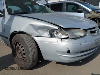 2000 Toyota Corolla VE with VIN 1NXBR12E6YZ393077, listed as a IAAI auction lot 42111914 with 181,056 mi miles and . Bid and sale history available at DreamBid. Image 18.