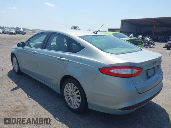2014 Ford Fusion SE Hybrid with VIN 3FA6P0LU8ER251057, listed as a IAAI auction lot 42150589 with 188,192 mi miles and . Bid and sale history available at DreamBid. Image 3.