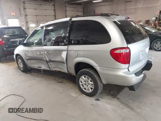 2003 Dodge Grand Caravan with VIN 2D4GP44353R166193, listed as a IAAI auction lot 41908698 with 181,371 mi miles and . Bid and sale history available at DreamBid. Image 3.