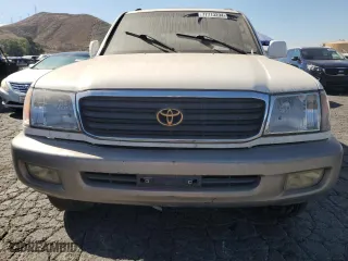 1999 Toyota Land Cruiser with VIN JT3HT05J0X0059222, listed as a Copart auction lot 77713294 with 406,869 mi miles and Clean Title. Bid and sale history available at carsss.com. Image 5.