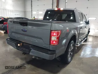 2019 Ford F-150 XL with VIN 1FTEW1EP4KKE93155, listed as a IAAI auction lot 41319964 with 105,248 mi miles. Bid and sale history available at carsss.com. Image 4.