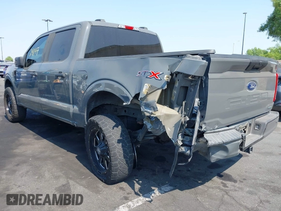 2021 Ford F-150 XL with VIN 1FTEW1CP6MFA09100, listed as a IAAI auction lot 42729047 with 27,593 mi miles and . Bid and sale history available at DreamBid. Image 3.