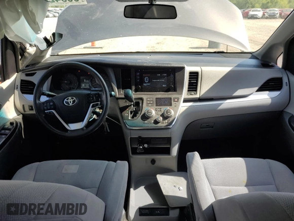2017 Toyota Sienna L with VIN 5TDZZ3DC5HS818593, listed as a Copart auction lot 56942894 with 114,359 mi miles and Salvage Title. Bid and sale history available at DreamBid. Image 8.