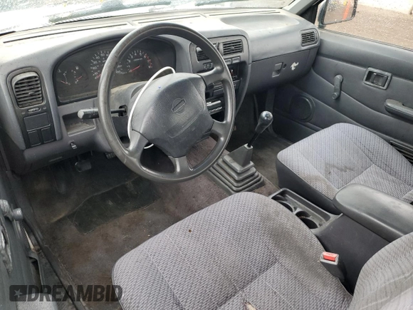 1997 Nissan Frontier XE with VIN 1N6SD16S8VC426940, listed as a Copart auction lot 55860235 with 242,265 mi miles and Salvage title. Bid and sale history available at DreamBid. Image 8.