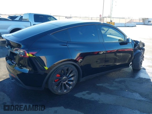2023 Tesla Model Y Performance with VIN 7SAYGDEF6PF854797, listed as a IAAI auction lot 41319332 with 46,132 mi miles and . Bid and sale history available at DreamBid. Image 4.