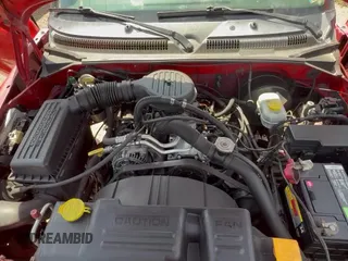 2001 Dodge Dakota с VIN 1B7GL22X61S151281, выставлен на аукционе Copart как лот 70411185 с пробегом 213 055 миль миль и Списание • Salvage title. История ставок и продаж доступна на DreamBid. Изображение 11.