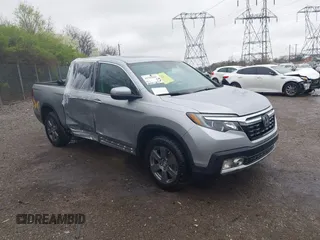 2020 Honda Ridgeline RTL-E with VIN 5FPYK3F73LB004365, listed as a IAAI auction lot 41965887 with 80,981 mi miles and . Bid and sale history available at DreamBid. Image 1.
