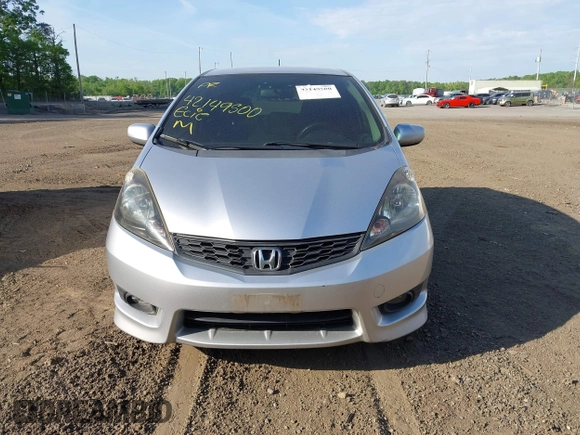 2013 Honda Fit Sport z VIN JHMGE8H69DC033802, wystawiony jako IAAI lot #42149500 z przebiegiem 144 980 mil mil oraz . Historia ofert i sprzedaży dostępna na DreamBid. Obrazek 12.