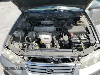 2000 Toyota Camry CE z VIN 4T1BG22KXYU639808, wystawiony jako Copart lot #56606985 z przebiegiem 119 678 mil mil oraz Szkoda całkowita • Salvage title. Historia ofert i sprzedaży dostępna na DreamBid. Obrazek 11.