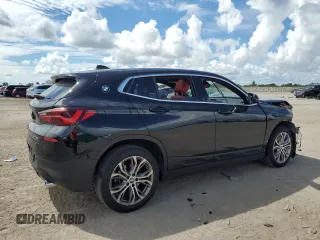 2022 BMW X2 sDrive28i with VIN WBXYH9C0XN5T86256, listed as a Copart auction lot 74173554 with 35,658 mi miles and Salvage Title. Bid and sale history available at carsss.com. Image 3.