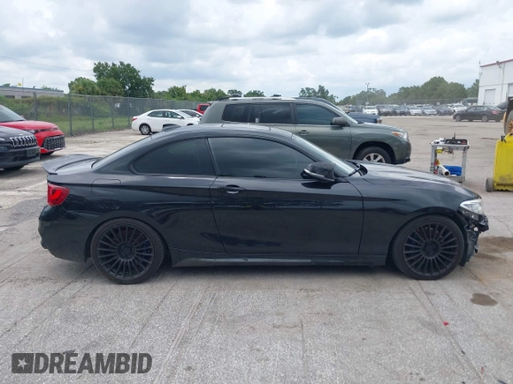 2015 BMW 2 Series M235i with VIN WBA1J7C5XFV289284, listed as a IAAI auction lot 42626668 with 179,944 mi miles and . Bid and sale history available at DreamBid. Image 14.