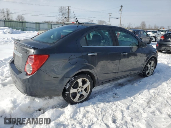 2013 Chevrolet Sonic LTZ z VIN 1G1JE5SH6D4114209, wystawiony jako Copart lot #44854675 z przebiegiem 130 385 mil mil oraz Czysty tytuł • Clean title. Historia ofert i sprzedaży dostępna na DreamBid. Obrazek 3.