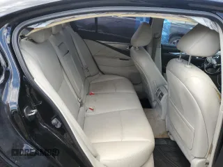 2015 Infiniti Q50 Premium z VIN JN1BV7ARXFM409465, wystawiony jako Copart lot #57295785 z przebiegiem 144 328 mil mil oraz Szkoda całkowita • Salvage title. Historia ofert i sprzedaży dostępna na DreamBid. Obrazek 10.