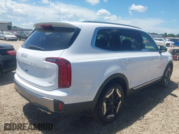 2025 Kia Telluride S with VIN 5XYP6DGC0SG590900, listed as a IAAI auction lot 42706596 with 6,712 mi miles and . Bid and sale history available at DreamBid. Image 4.
