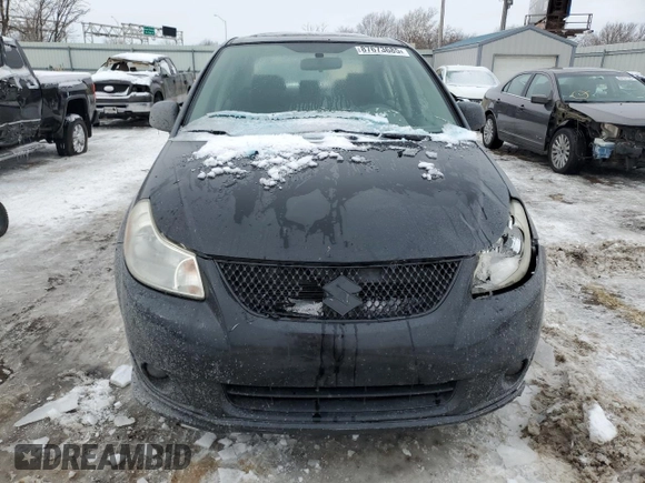 2011 Suzuki SX4 with VIN JS2YC5A44B6300171, listed as a Copart auction lot 87673685 with 116,483 mi miles and Salvage Title. Bid and sale history available at DreamBid. Image 5.