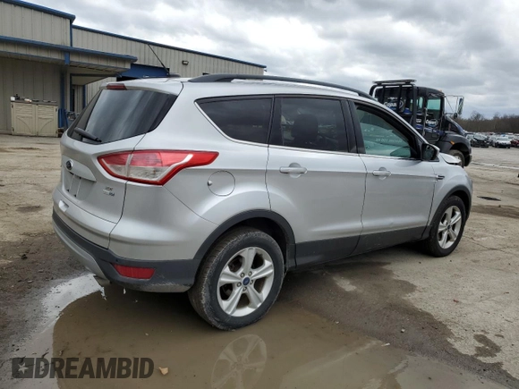 2016 Ford Escape SE with VIN 1FMCU9G94GUA74899, listed as a Copart auction lot 51660155 with 91,047 mi miles and Salvage Title. Bid and sale history available at DreamBid. Image 3.