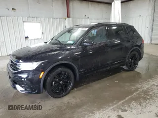 2022 Volkswagen Tiguan SE R-Line Black with VIN 3VV8B7AX6NM168877, listed as a Copart auction lot 47400525 with 21,601 mi miles and Salvage Title. Bid and sale history available at DreamBid. Image 1.