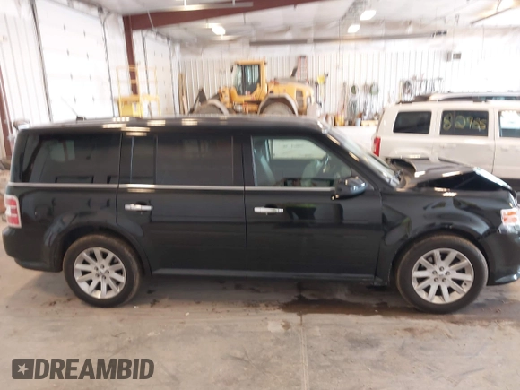2010 Ford Flex SEL z VIN 2FMGK5CC7ABB22233, wystawiony jako IAAI lot #42191719 z przebiegiem 126 460 mil mil oraz . Historia ofert i sprzedaży dostępna na DreamBid. Obrazek 13.
