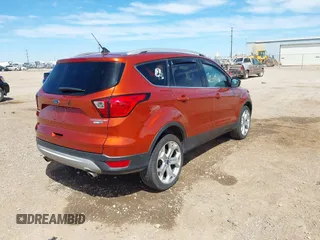 2019 Ford Escape Titanium with VIN 1FMCU9J92KUB28895, listed as a IAAI auction lot 42065235 with 112,305 mi miles and . Bid and sale history available at DreamBid. Image 4.
