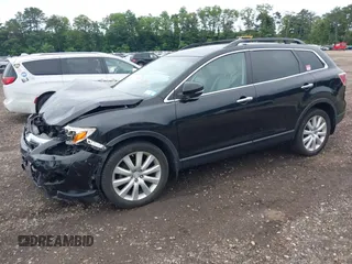 2010 Mazda CX-9 Grand Touring with VIN JM3TB3MV9A0237626, listed as a IAAI auction lot 42608623 with 141,520 mi miles and . Bid and sale history available at DreamBid. Image 2.
