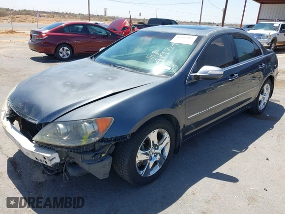 2005 Acura RL z VIN JH4KB16505C012679, wystawiony jako IAAI lot #41976411 z przebiegiem 103 342 mil mil oraz . Historia ofert i sprzedaży dostępna na DreamBid. Obrazek 19.