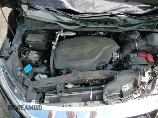 2021 Honda Odyssey Touring с VIN 5FNRL6H85MB021963, выставлен на аукционе Copart как лот 61424335 с пробегом 68 929 миль миль и Списание • Salvage title. История ставок и продаж доступна на DreamBid. Изображение 16.