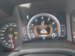 2015 Chevrolet Corvette 1LT with VIN 1G1YB3D7XF5124917, listed as a IAAI auction lot 41567848 with 104,886 mi miles. Bid and sale history available at carsss.com. Image 7.